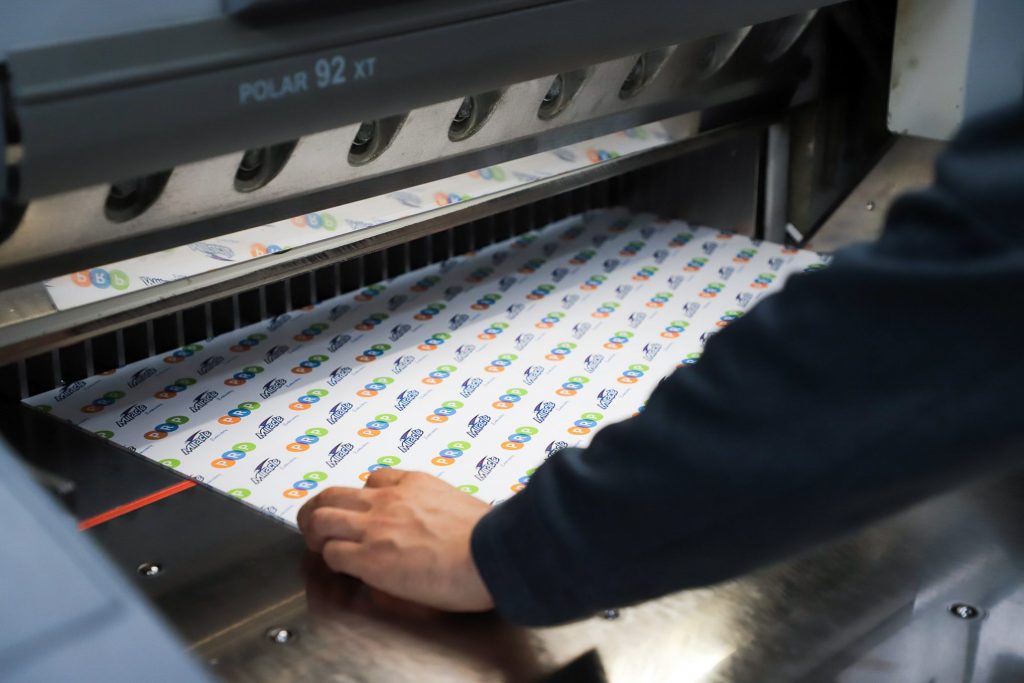 Poor Richard's Press chipboard being cut