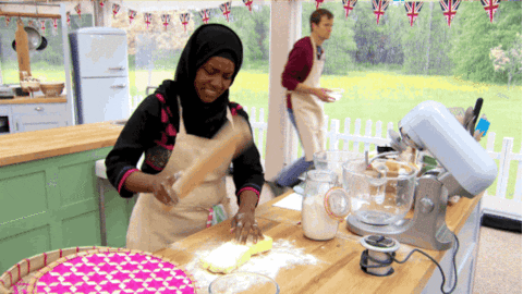 gif of someone smashing dough with a rolling pin